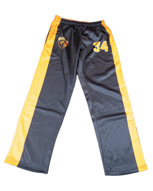 A pair of athletic track pants in dark gray and yellow, featuring a drawstring waist, side stripes, a team crest on the left thigh, and the number 34 on the right thigh.
